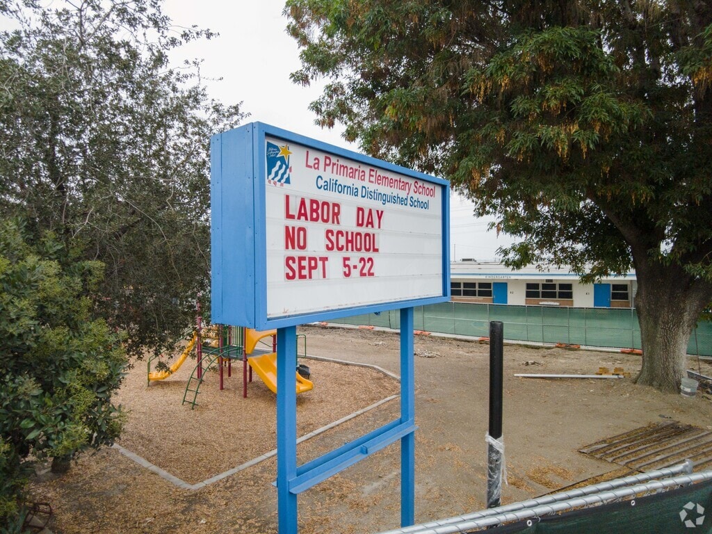El Monte's La Primaria Elementary School entrance sign displays school news and updates.