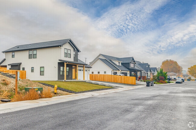 Homes in Zillah sit on tidy lawns along residential streets with a suburban feel.