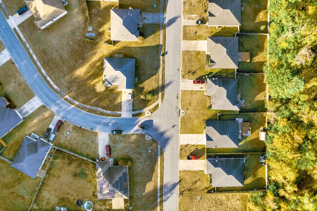 Well-landscaped lawns are a point of pride for many Chicot West homeowners.