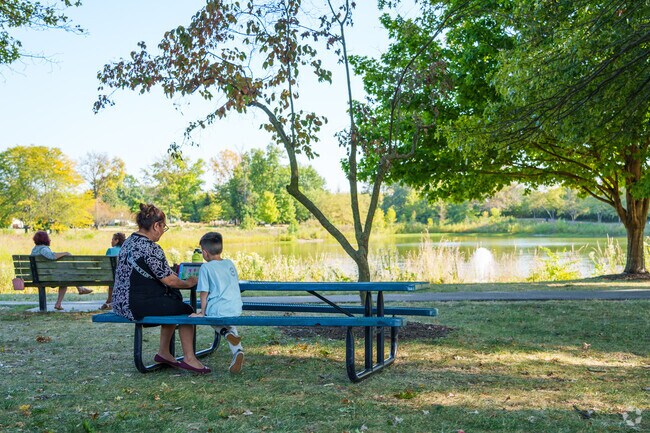 Take a seat and surround yourself with the beauty at Armstrong Park near Dover Estates.