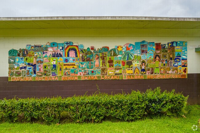 Brightly colored murals decorate exterior walls at Kahaluu Elementary School.