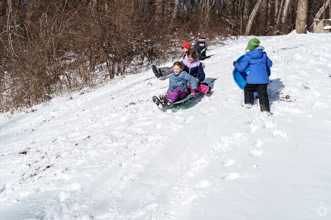 Cold temps and snow make for fun sledding on this hill at Marsh Creek State Park.