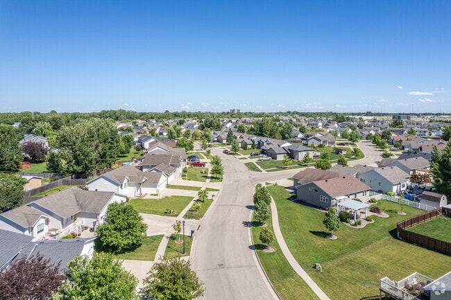 Elmwood Court offers a serene lifestyle with beautifully crafted homes in a peaceful setting.