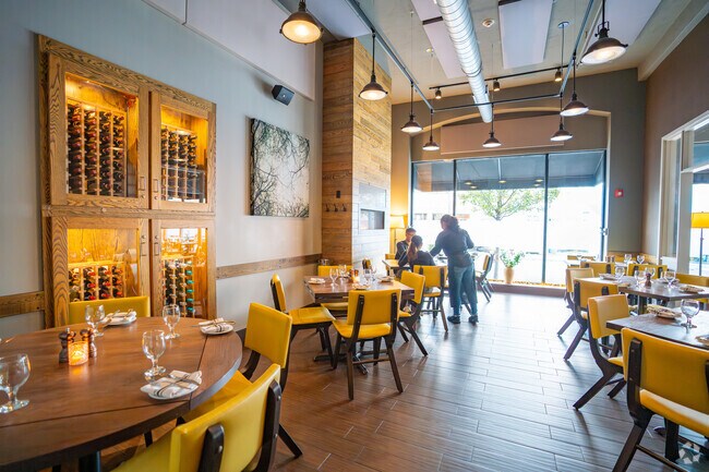 Take a seat by the fire at the Rosetti Restaurant near Lynn Highlands.