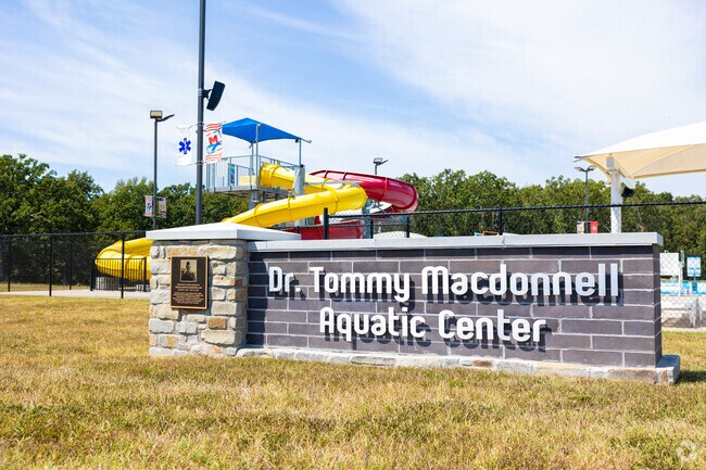 Dr. Tommy Macdonnell Aquatic Center offers slides and splash pools in summer.