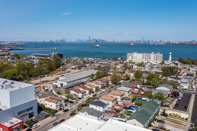 Aerial View of Tompkinsville Section of Staten Island with multiple skyline views in the background.