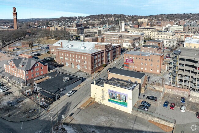 The Waterbury mural and the Union Station Building Tower shine bright in the afternoon sun.
