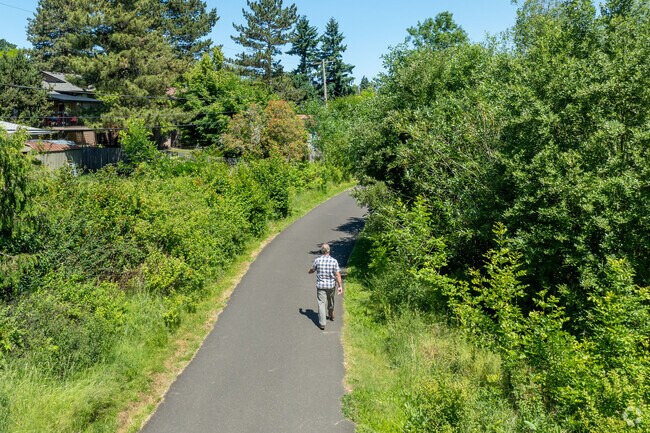 Residents and visitors enjoy the well-paved walking paths of Fanno Creek Park.