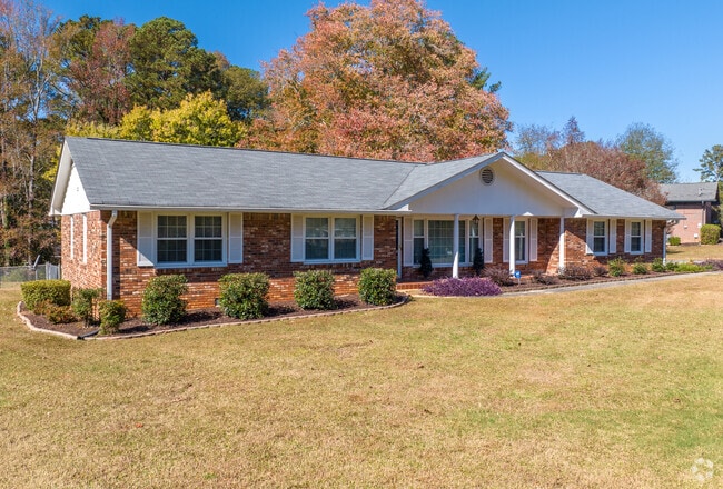 Ranch style homes sit on large acreage in the Kenwood area and blend with the natural elements.