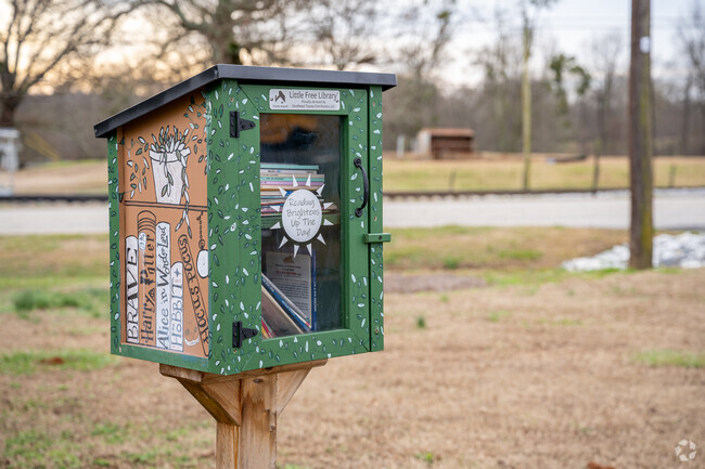 Enjoy a book from the Free Library in front of North Jackson Elementary School.