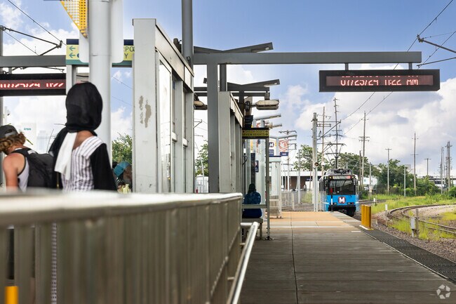 The Metro Link light rail system at Grand Station is on the north side of Tiffany neighborhood.
