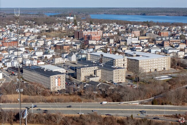 Historic textile mill buildings are part of the fabric of the Flint neighborhood.