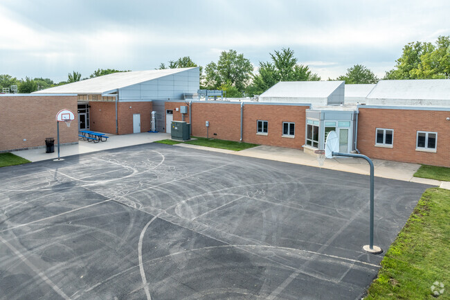 A basketball court is great outdoor space at Tate Alternative High School.