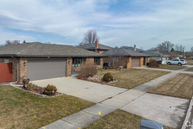 Homes in Silver Lake South offer private driveways and attached garages.