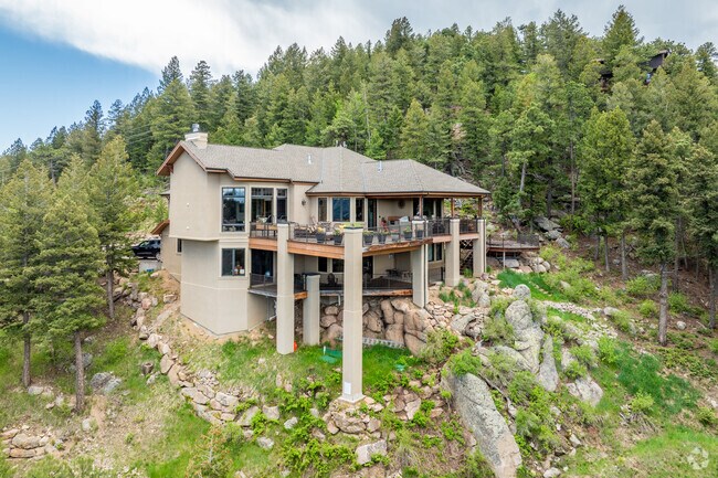 Modern mountain homes in North Turkey Creek use elements and designs to blend into its surroundings.