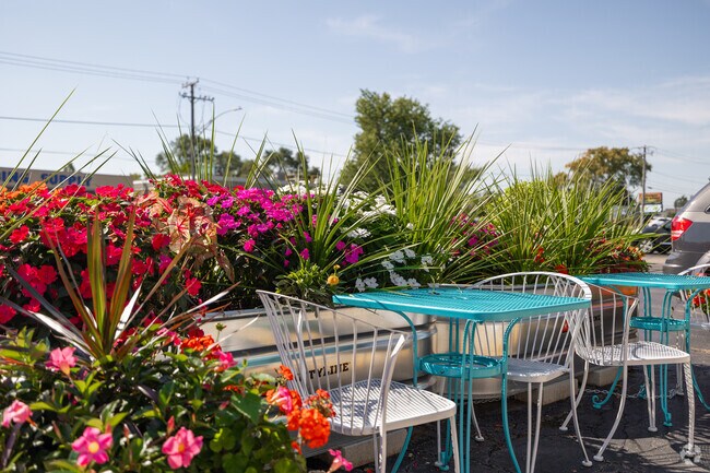 Enjoy the colorful patio seating at Honeybella Pancakes & Cafe.
