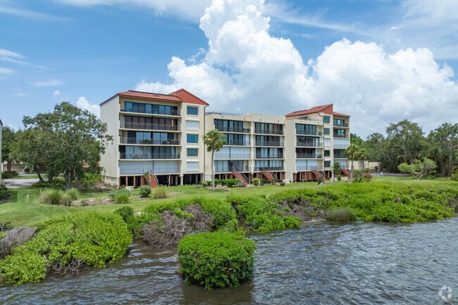 Condos by the water in El Conquistador offer serene views and easy access to the bay.