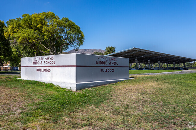The signage at the entrance of Ruth O. Harris Middle School proudly displays its name