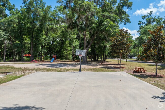 Students play basketball at Passage Christian Academy.