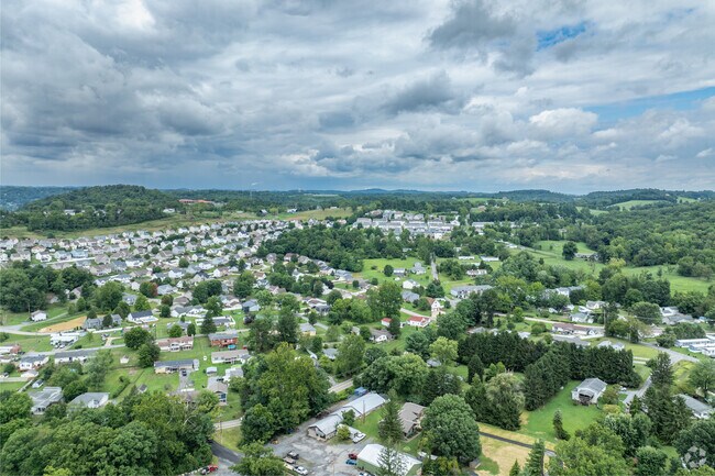 Older homes with larger yards in Brookhaven contrast against the newer developed housing plans.