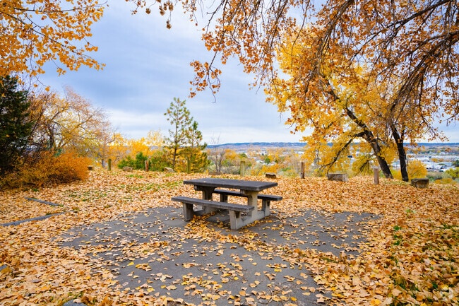 Two Moon Park offers walking trails and picnic tables next to the Yellowstone River.