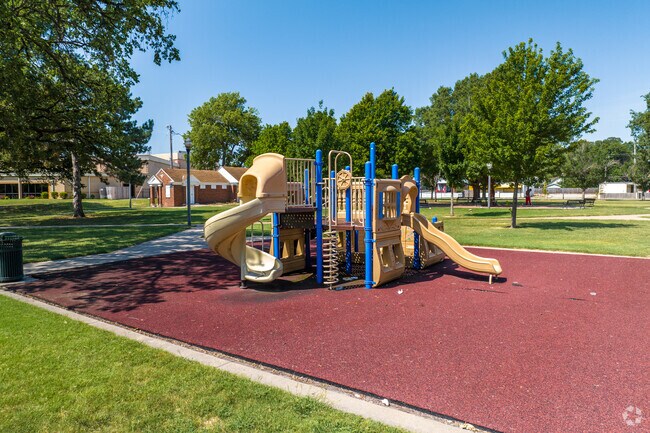 Kids can climb on the playground at South Central's Lincoln Park.