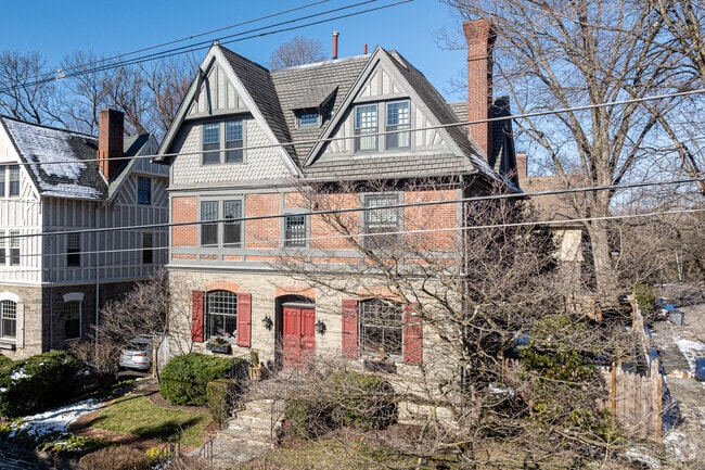 This home made from stone, brick, and half-timber is unique among Chestnut Hill houses.