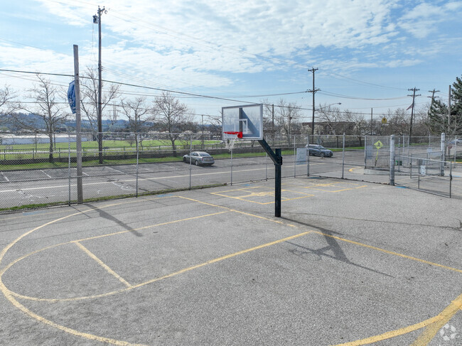 Students enjoy playing basketball for recess.