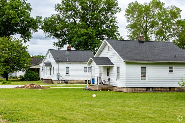 Properties in Sugar Grove-Indian Acres have big green lawns for the kids to play on.