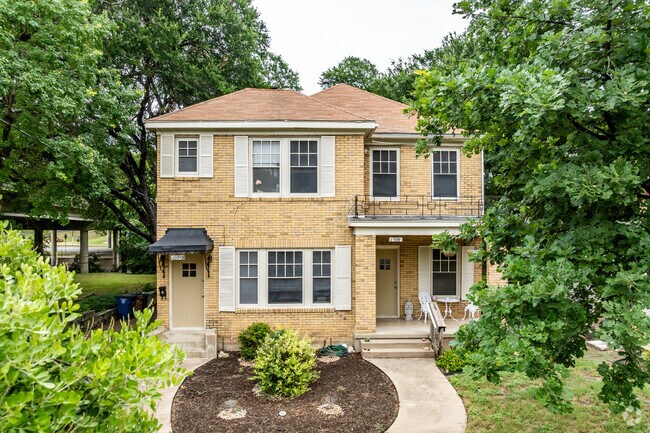 This Colonial Revival home is an all-brick construction with 2 stories in Old Enfield.