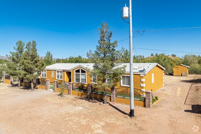 Naco has charming homes with mid size trees complementing the area.