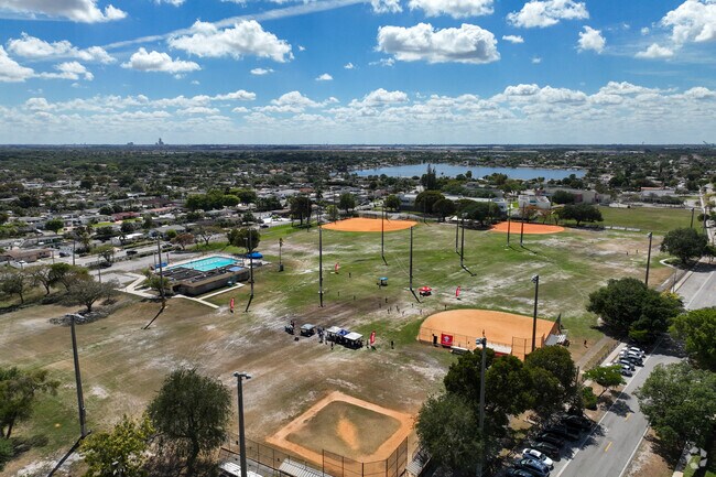Baseball players can hit a home run on the baseball diamond within Norman and Jean Reach Park.