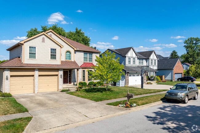 Most homes in the Brookhollow neighborhood have attached garages.