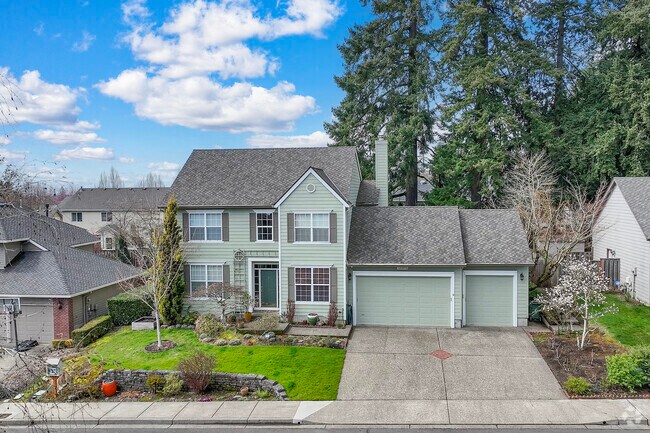 Green colonial revival home within the Neighbors Southwest community.