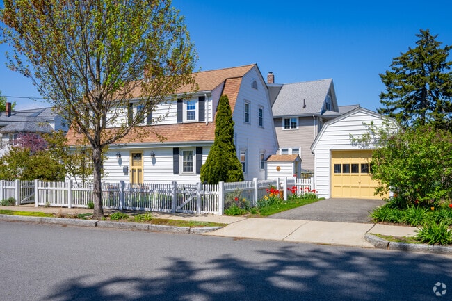 Live in style with the color of your front door matching your garage door in East Arlington.