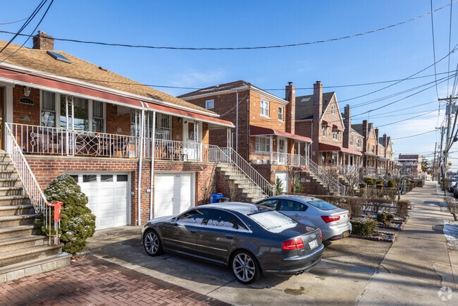Some homes in Allerton have driveways for convenient parking in the Bronx.