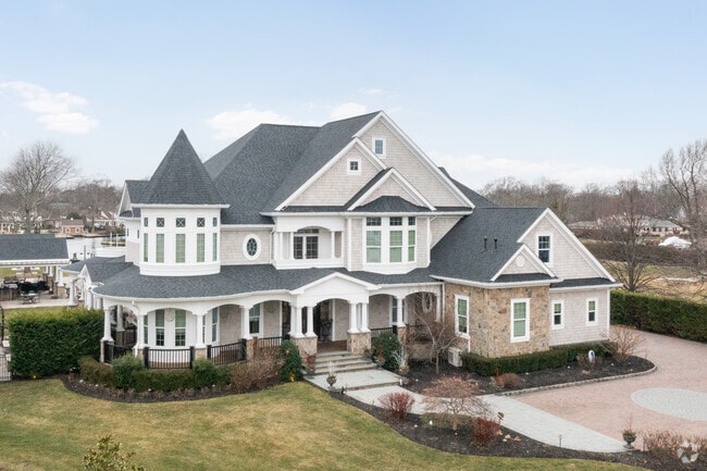 Colonial man is a luxury home example that shines in some neighborhoods in Babylon, New York.
