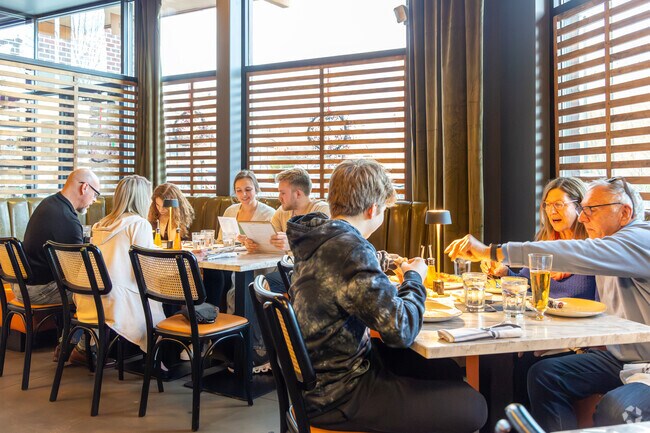 Armbrust Acres residents enjoy dinner at Dante pizzeria.