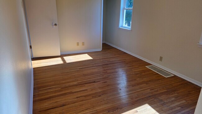 Bedroom 2, hardwood floor
