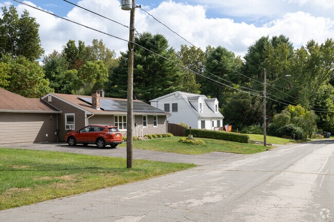 Colchester homes line a quiet street near schools and parks.