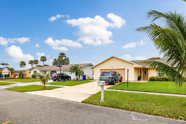 Tranquil street near Lone Pines where a row of homes exude peace and serenity.