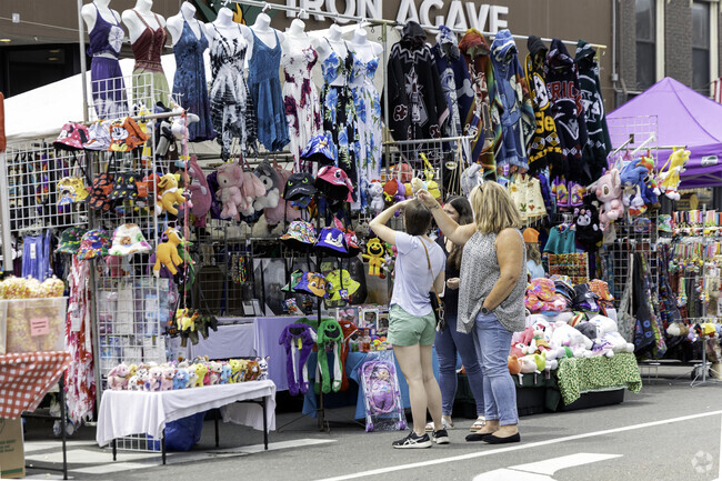 Residents shopping at a street fair in the West Side community.