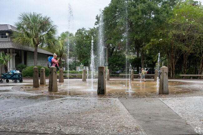 Kids love the splash pad at Coligny Beach.