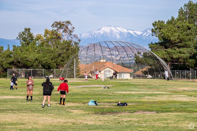 Serfas Club Park with a mountain backdrop in the Green River neighborhood.