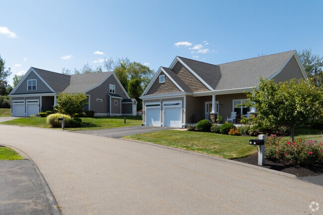 Detached condos featuring two-car garages are the norm within Windham's 55+ Mid Trail Crossing community.
