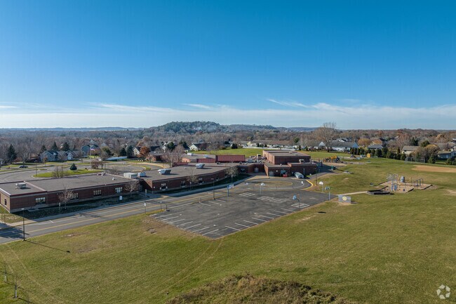 Rocky Branch Elementary has a large campus in River Falls featuring multiple playgrounds.