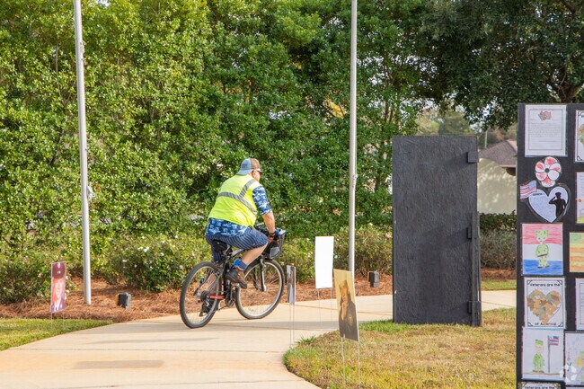 Pamona residents enjoy the trails at nearby Honor Park.