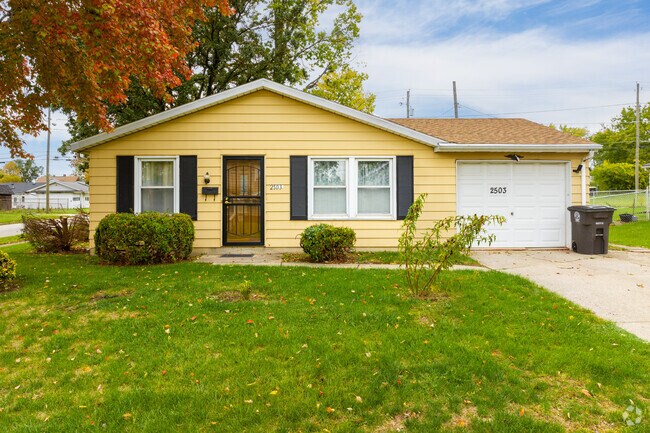 This small home features a single car garage in Memorial Park.