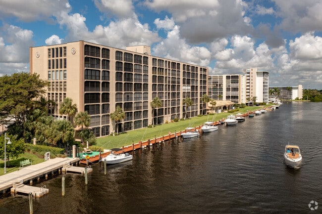 Dock and Boats at Hillsboro Landings One Condo, The Cove Neighborhood, Deerfield Beach, Florida.
