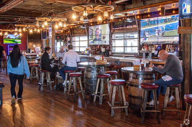 Cowboy Jacks near Black Forest is a casual venue with American fare and cocktails, a fireplace, a mechanical bull, and karaoke nights.